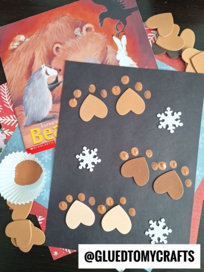 Use a small, heart shaped stickers to make paw prints on paper