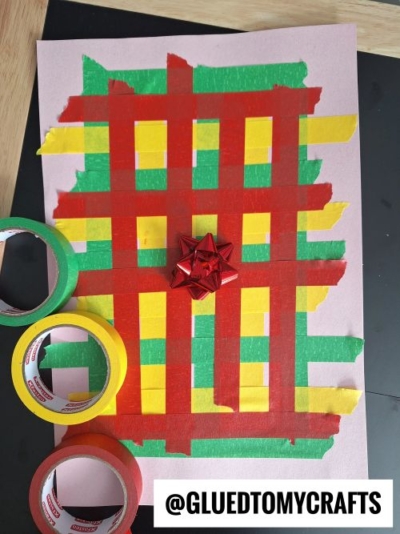 USE PAINTER'S TAPE TO MAKE A CHRISTMAS PRESENT DESIGN ON PAPER