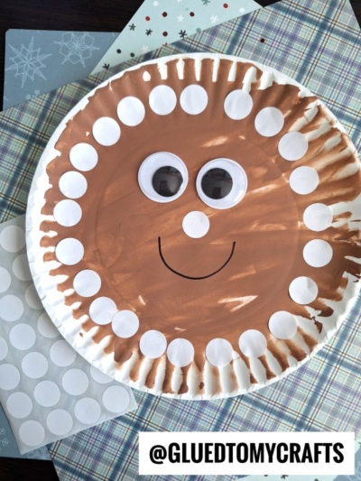 Paper Plate Gingerbread Man Face - use circle stickers for the "frosting"