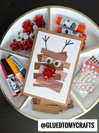 Use brown paper strips and gift bows to make a reindeer cards for the holidays