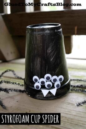 A black-painted styrofoam cup spider is made by turning a cup upside down, adding six googly eyes, two white paper fangs, and black pipe cleaner legs. Text reads STYROFOAM CUP SPIDER.