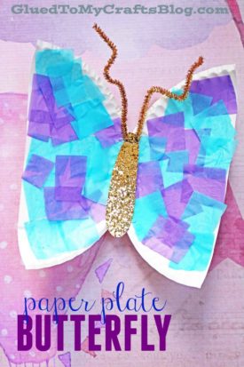 Colorful paper plate butterfly craft featuring blue and purple tissue squares, a gold glitter body, and orange pipe cleaner antennae on a pink background. Text reads “paper plate BUTTERFLY.”.