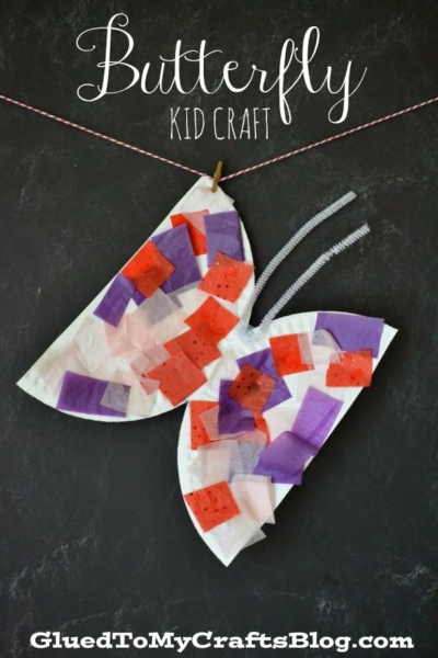 A butterfly craft made from a folded white coffee filter decorated with red, purple, and pink tissue paper squares, clipped to a string with a clothespin and pipe cleaner antennae—just like a paper plate butterfly! Text reads Butterfly Kid Craft.