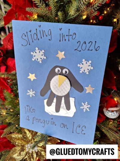 SLIDING INTO A NEW YEAR LIKE A PENGUIN ON ICE KEEPSAKE