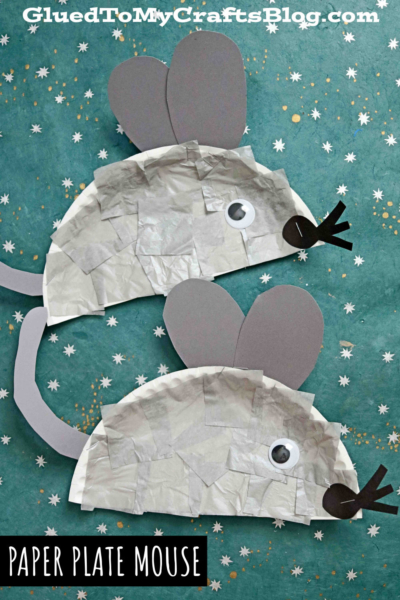 Two adorable Paper Plate Mouse crafts made with paper plates, gray paper ears and tails, googly eyes, and black noses are displayed on a star-patterned teal background. The text reads “PAPER PLATE MOUSE.”.