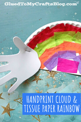 A craft showing how to make a tissue paper rainbow: a white handprint cloud cutout and half a paper plate with colorful tissue paper pieces arranged as a rainbow on blue, accented with gold stars. Text reads “Handprint Cloud & Tissue Paper Rainbow.”.