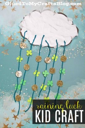 A paper craft called "Raining Luck" features a white tissue cloud with blue yarn rain, gold glitter circles, and green shamrocks on a starry blue background. Text reads “raining luck KID CRAFT.”.