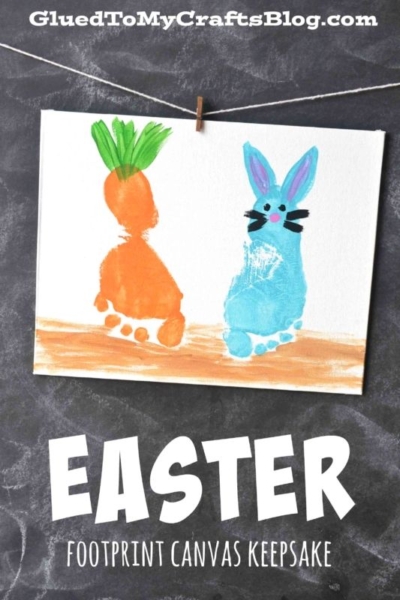 A painted footprint Easter canvas hangs by a clothespin, displaying two colorful footprints transformed into a carrot and a bunny with paint and details. Text above and below reads Easter Footprint Canvas Keepsake.