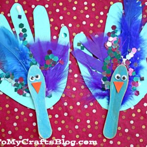 Scoop Stick Handprint Peacock Puppet - Kid Craft