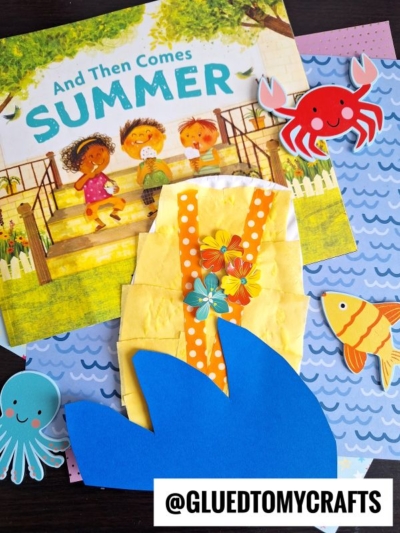A summer-themed children’s book, colorful paper crafts shaped like ocean waves, a dress, a crab, a fish, an octopus, and a paper plate surfboard, with the handle @GLUETOMYCRAFTS in the foreground.