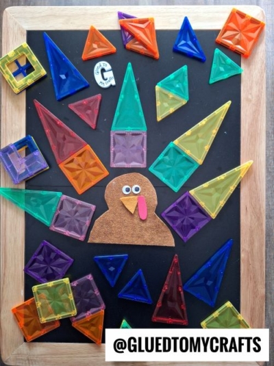 USE MAGNETIC TILES TO "BUILD" A TURKEY ON A LARGE TABLE