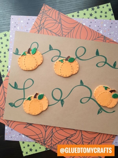 DRAW SQUIGGLE LINES ON PAPER AND ADD PUMPKIN STICKERS FOR THE PUMPKIN PATCH CRAFT IDEA