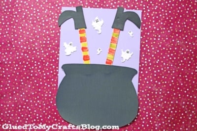 Popsicle Stick Witch Legs In Paper Cauldron