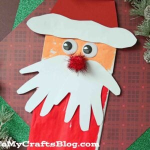 A festive Paper Bag Santa Puppet features a white paper beard, googly eyes, red pom-pom nose, and a red paper hat.