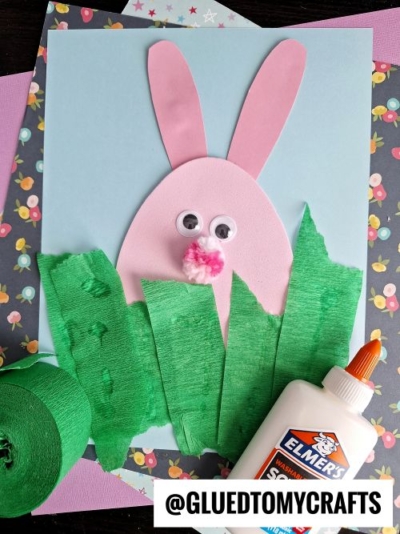EGG SHAPED BUNNY HIDING IN THE GRASS