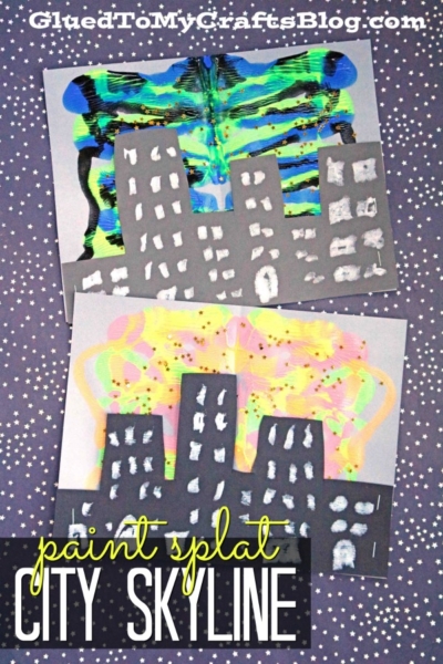 A group of art pieces featuring a vibrant paint splatter skyline creates a dynamic and colorful urban vibe.
