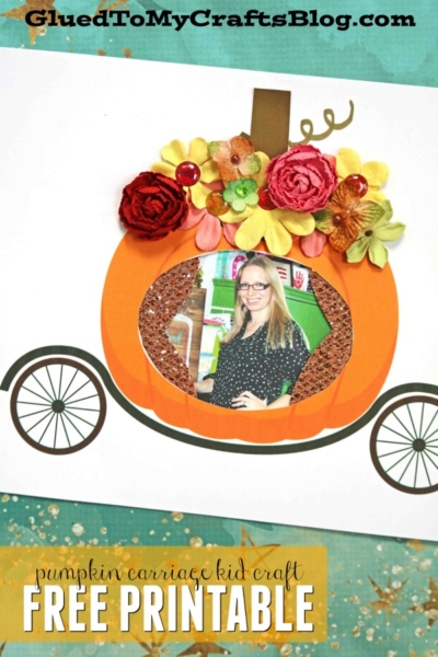 A paper pumpkin Cinderella carriage featuring a child’s photo in the center, topped with colorful fabric flowers. The white background has wheels drawn on each side. Text reads pumpkin carriage kid craft FREE PRINTABLE.