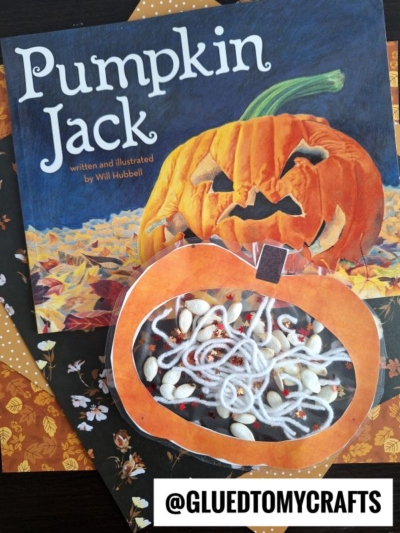 A children’s book titled Pumpkin Jack rests on autumn-themed paper, beside an "inside my pumpkin craft" made from orange paper, yarn, and pumpkin seeds. A watermark reads @GLUEDTOMYCRAFTS.
