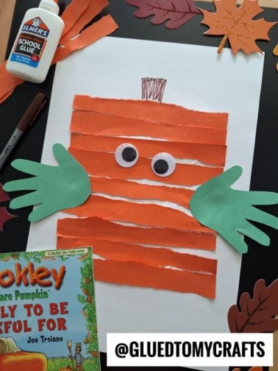 HANDPRINT & TORN PAPER SPOOKLEY PUMPKIN CRAFT IDEA