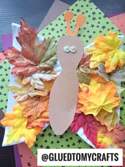 USE A PAPER PLATE CUT IN HALF TO MAKE A FALL THEMED BUTTERFLY