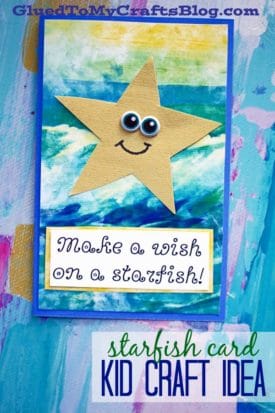 A handmade card with a large yellow starfish featuring googly eyes and a smile on a blue and green painted background. The card says, Make starfish wishes! Starfish card kid craft idea.