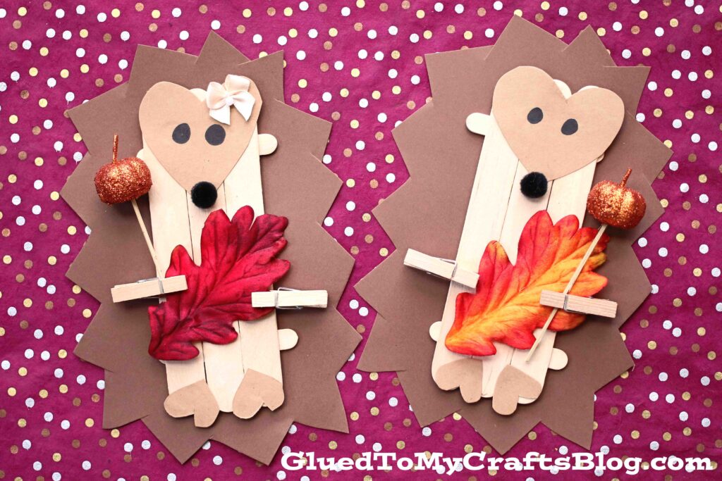 Colorful popsicle stick hedgehog puppet craft for kids with fall-themed decorations