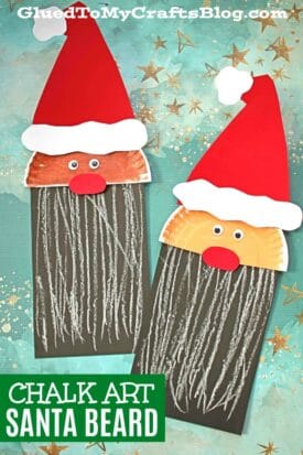 Two Santa Claus crafts inspired by Chalk Art Santa, made from painted paper plates, red and white hats, googly eyes, red noses, and gray yarn beards, displayed on a blue background with stars.