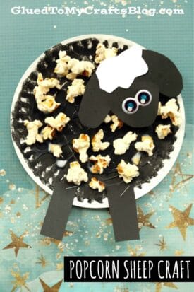 Paper Plate and Popcorn Covered Black Sheep Craft For Kids