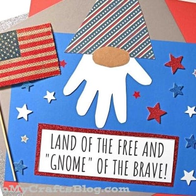 A patriotic craft featuring a handprint patriotic gnome with a striped hat, American flag, stars, and the phrase “Land of the free and gnome of the brave!”—the perfect Handprint Patriotic Gnome Keepsake Craft.