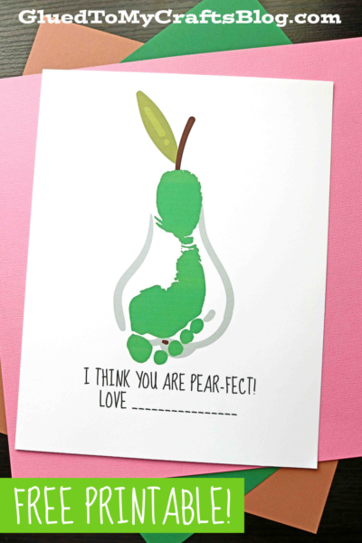 A craft printout features a green footprint pear keepsake made with toe prints, with text below reading I THINK YOU ARE PEAR-FECT! LOVE __________. Pink and green paper are underneath.