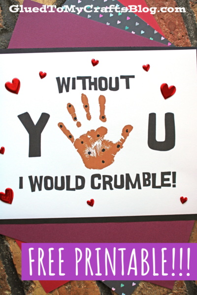 A card with a handprint cookie forming the letter O in YOU, reading Without YOU I would crumble! Red heart decorations and text at top and bottom say GluedToMyCraftsBlog.com and Free Printable!!!.