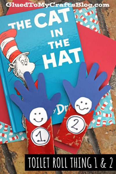 A copy of The Cat in the Hat book is shown with two crafts made from toilet roll Thing 1 and Thing 2, featuring blue handprints, red painted rolls, and smiling faces labeled 1 and 2.