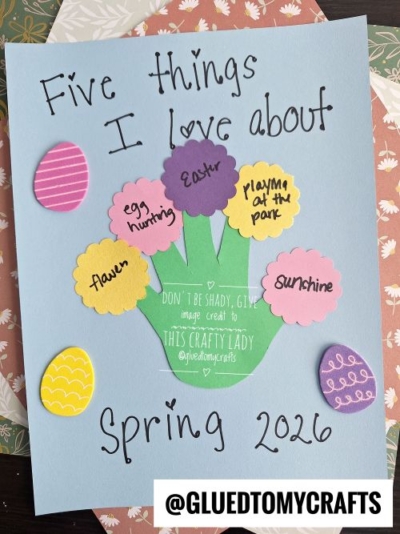 A blue paper with a green handprint lists Five things I love about Spring 2026, decorated with colorful paper eggs and flowers—a perfect project for flower kids crafts. The list includes Easter, egg hunting, playtime at the park, flowers, and sunshine.