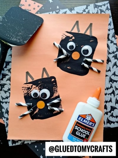 Spatula Stamped Black Cat - use paper straws for the whiskers