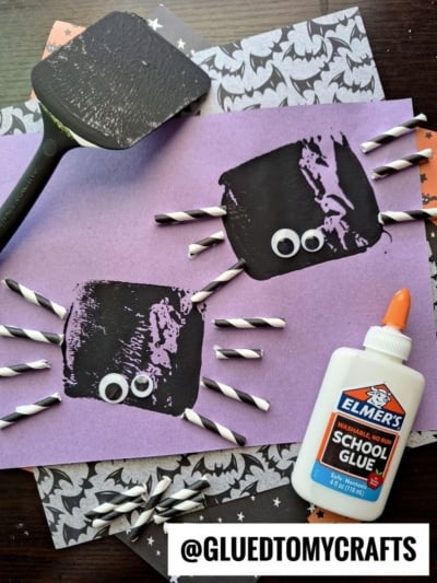 Spatula Stamped Black Spiders - use paper straws for their legs
