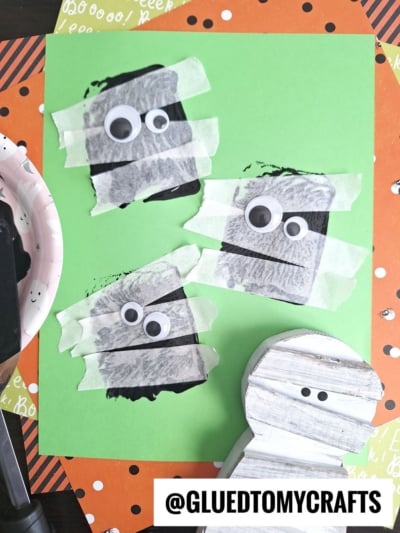 Spatula Stamped Mummies - use painter's tape for the wraps