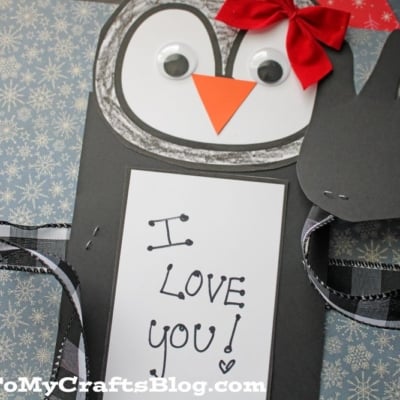 Handprint Penguin Hug Craft Idea