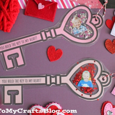 Valentine’s craft featuring two large "key to my heart" paper keys with heart-shaped photo cutouts
