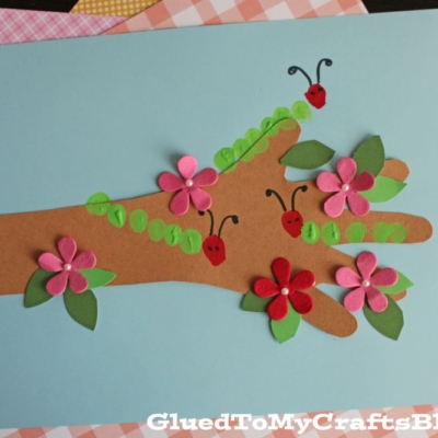 Fingerprint Caterpillars On Handprint Tree Branch