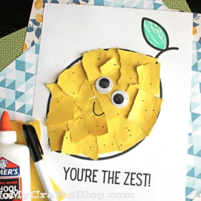 A fun kids’ craft project featuring a torn paper lemon made from yellow paper pieces glued to a white sheet, complete with googly eyes, a drawn leaf, and the text “YOU’RE THE ZEST!”