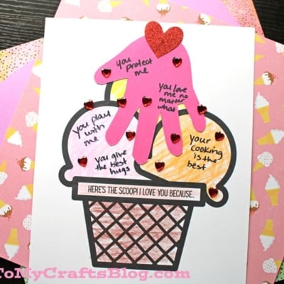 Here's The Scoop! I Love You Because Ice Cream Keepsake - Craft card shaped like ice cream, with a handprint and love notes, decorated with heart gems.