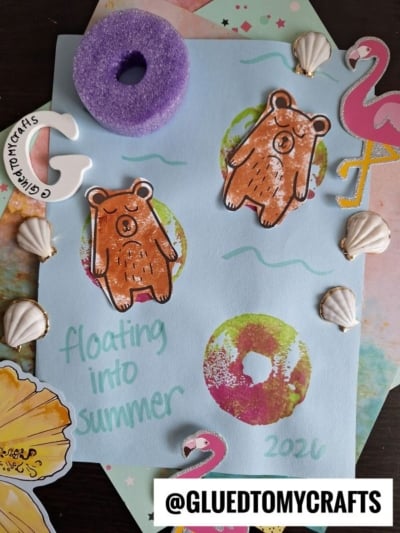 A summer-themed craft page features a lazy river bear craft with bears, pool floats, a flamingo, seashells, and colorful water patterns. Text reads floating into summer 2026 and @GLUEDTOMYCRAFTS is labeled at the bottom.