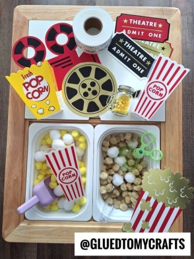 POPCORN SENSORY TABLE IDEA - USE POM POMS & PLASTIC POPCORN BOXES