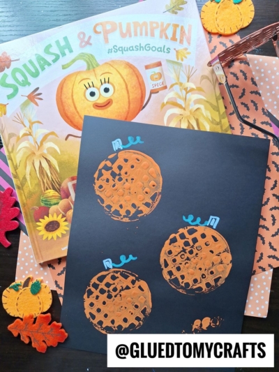 Potato Masher Stamped Pumpkins For Story Time