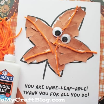 A fall craft featuring a torn paper leaf outline, decorated with brown paper, orange yarn, and googly eyes. Below it reads, You are unbe-leaf-able! Thank you for all you do! Craft supplies surround the page.