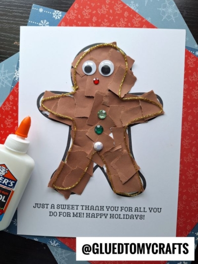 A handmade torn paper gingerbread man is decorated with googly eyes, buttons, and gold glitter glue on a card that reads, Just a sweet thank you for all you do for me! Happy Holidays!.