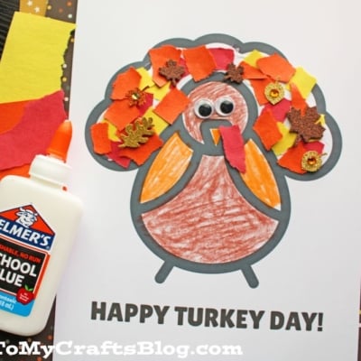 A torn paper turkey drawing sits on a piece of paper, featuring colorful textures and playful details.
