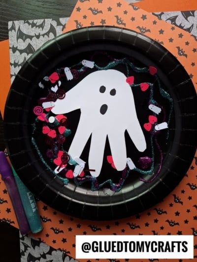 HANDPRINT GHOST ON PAPER PLATE
