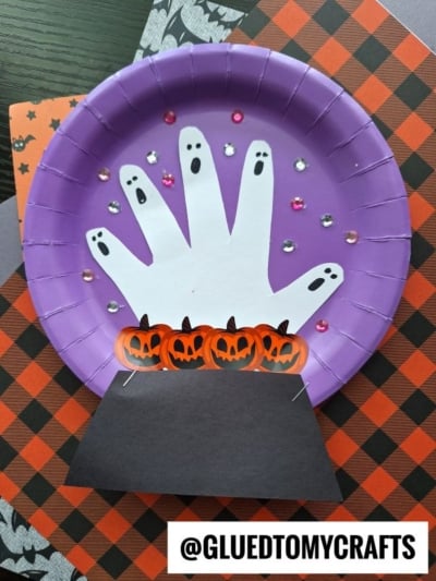 PAPER PLATE HALLOWEEN CRYSTAL BALL WITH HANDPRINT GHOSTS INSIDE