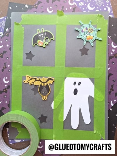 HANDPRINT GHOST WINDOW CRAFT IDEA - USE PAINTER'S TAPE FOR THE WINDOW DESIGN